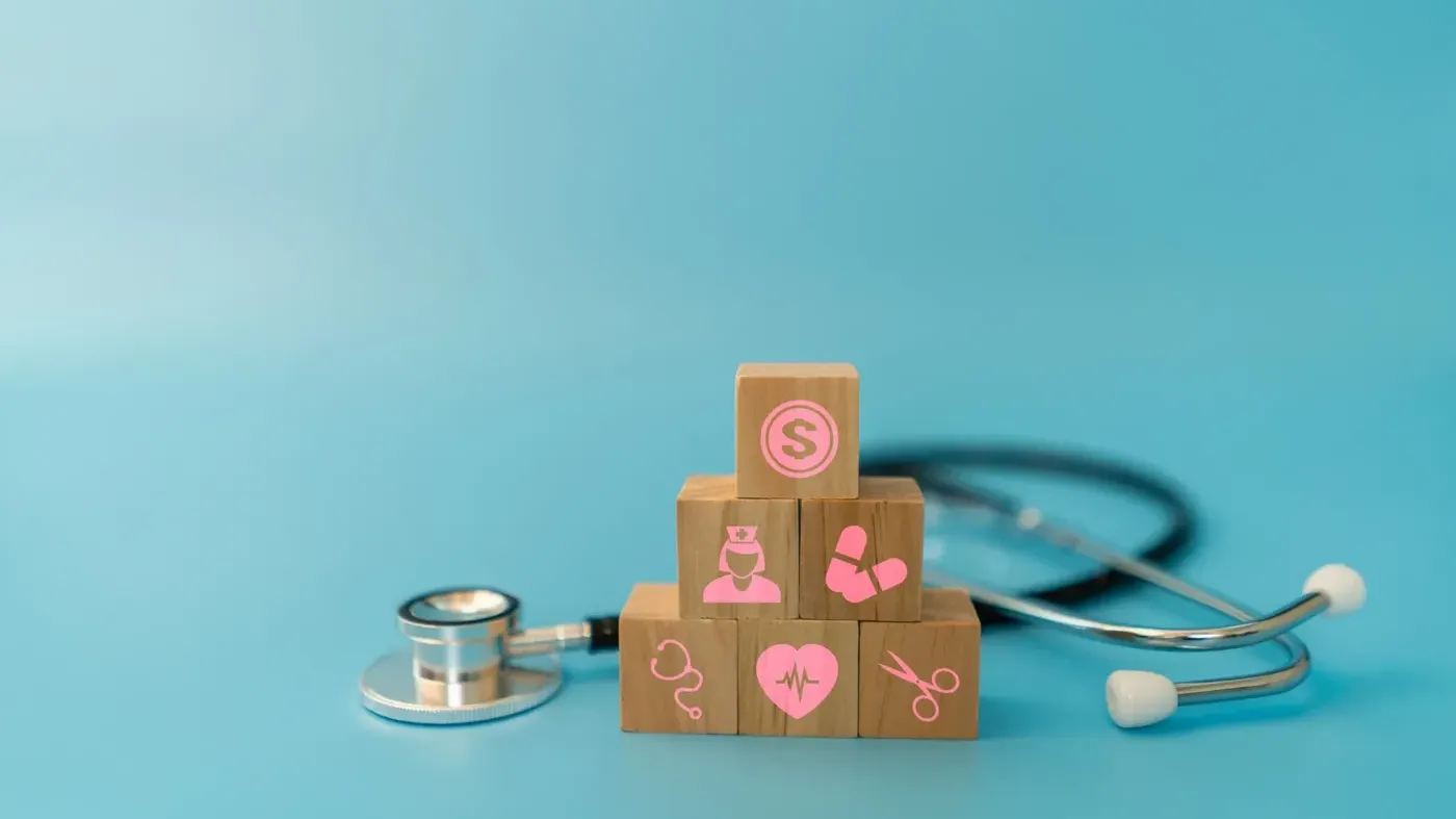 building blocks with health symbols