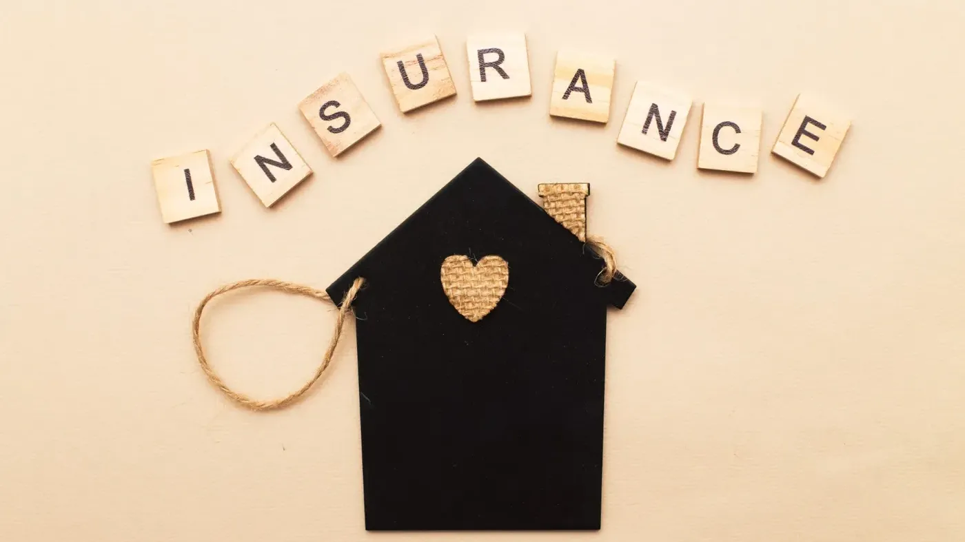 insurance over a black house